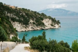 Breathtaking coastal landscape of Zakynthos, Greece with turquoise waters and lush greenery.